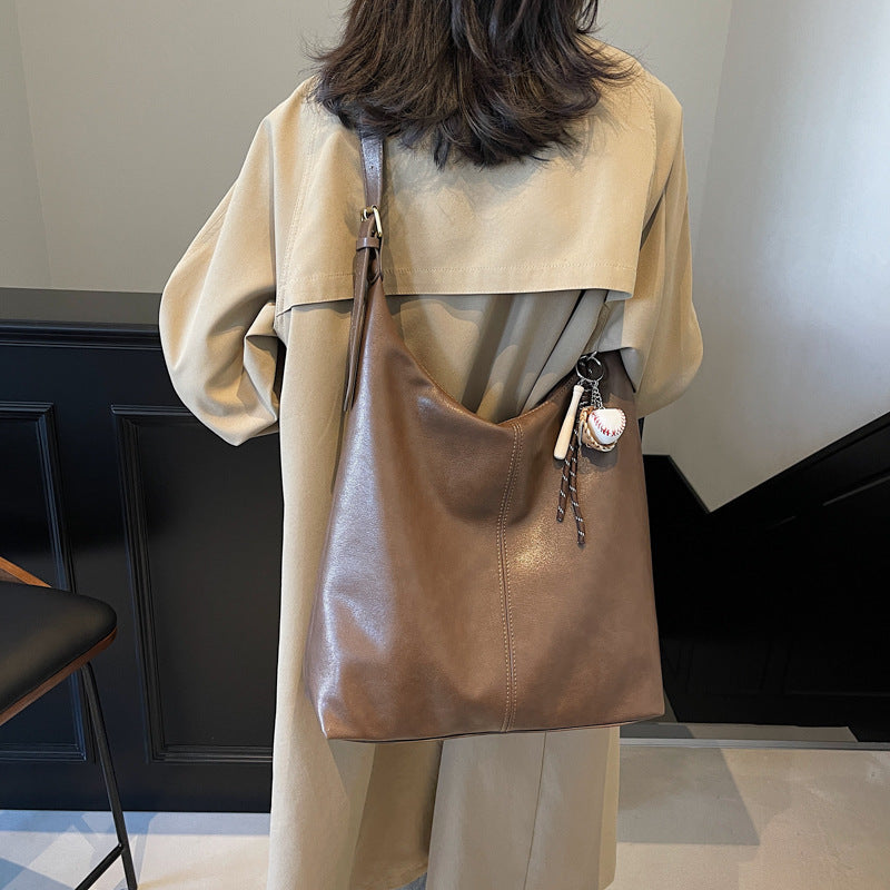 Casual commuting retro large-capacity bag women's 2025 new winter and winter shoulder bag college students class tote bag