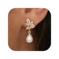 European and american cross-border hot seller: fashionable, exquisite, compact, and luxurious pearl pendant earrings for women - exuding a high-end, elegant, and sophisticated "it girl" vibe