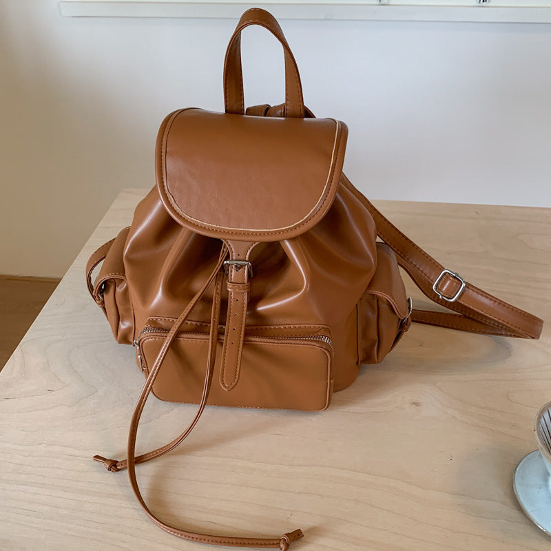 Simple and fashionable soft leather backpack bag 2025 summer new large-capacity backpack college student drawstring schoolbag women's bag