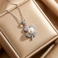8442 pearl clover flower steel necklace