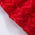 Girls' dress for toddlers and young children, featuring a large bow, pearl embellishments, and a 3d wavy tulle skirt