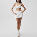 Lace-trimmed bra, lace-trimmed mini skirt, high-waisted tummy-control yoga pants, slimming camisole, running sports three-piece summer set