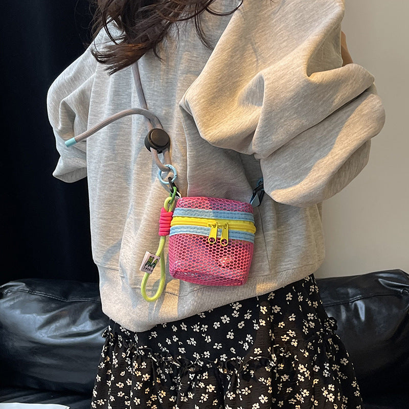 Cross-border exquisite super-fire hollow bag women's 2025 new summer versatile messenger bag mini change bag mouth red envelope