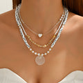 Wholesale seashell beaded necklaces - european & american style, cross-border e-commerce, sweater accessories for women, layered necklaces, unique heart & pearl clavicle chains