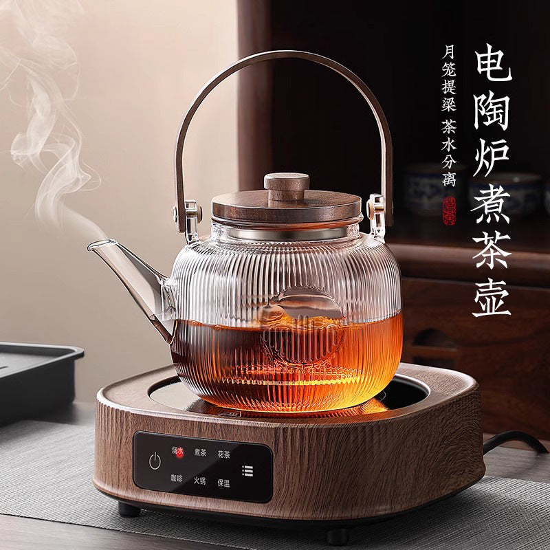 A complete set of wood grain electric ceramic stoves for making tea around the stove, a set of glass teapots for making tea around the stove, and an electric stove