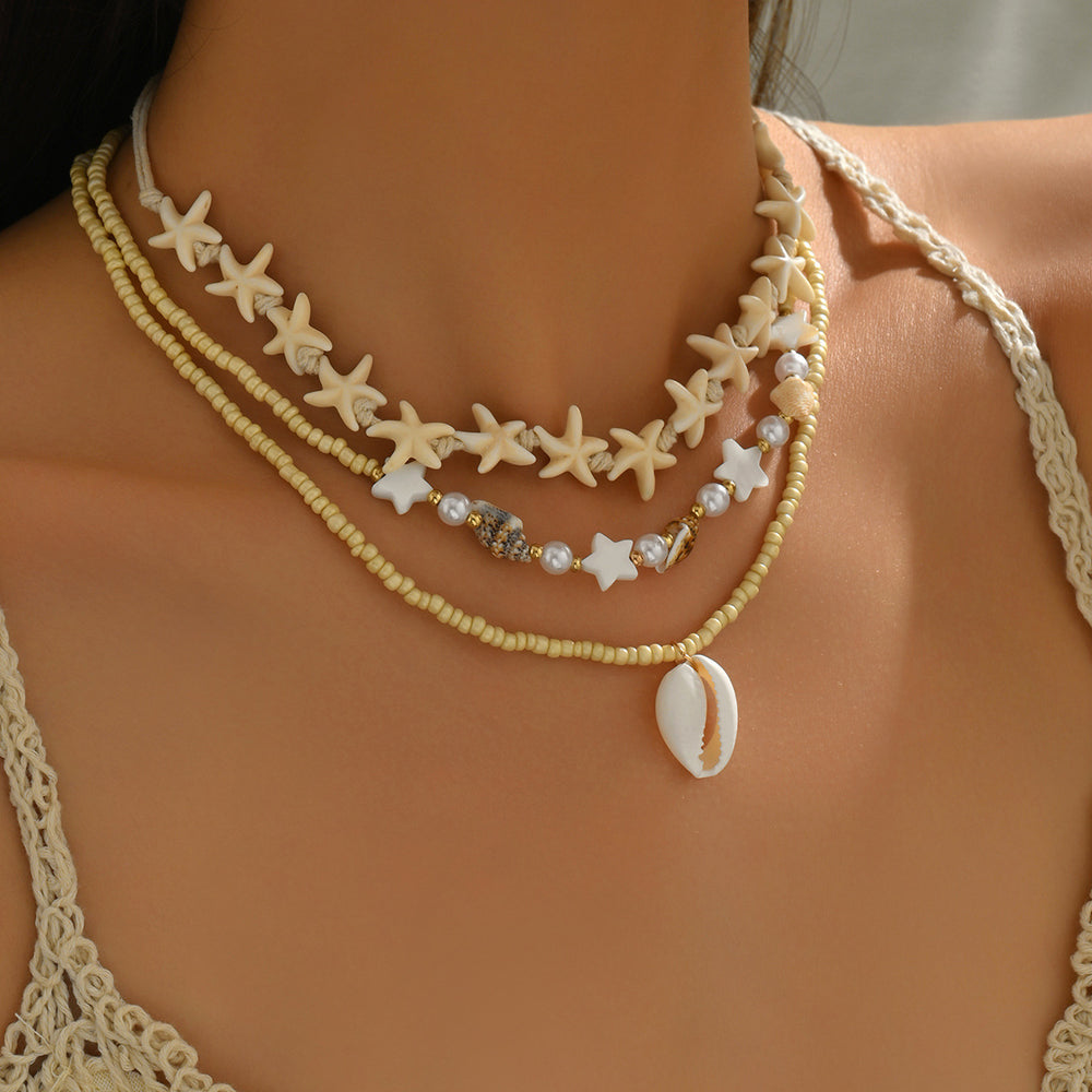 Wholesale autumn/winter sweater necklaces: european & american cross-border style - ocean-inspired starfish & seashell jewelry, subtly luxurious, niche design, stackable pearl chokers