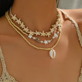 Wholesale autumn/winter sweater necklaces: european & american cross-border style - ocean-inspired starfish & seashell jewelry, subtly luxurious, niche design, stackable pearl chokers