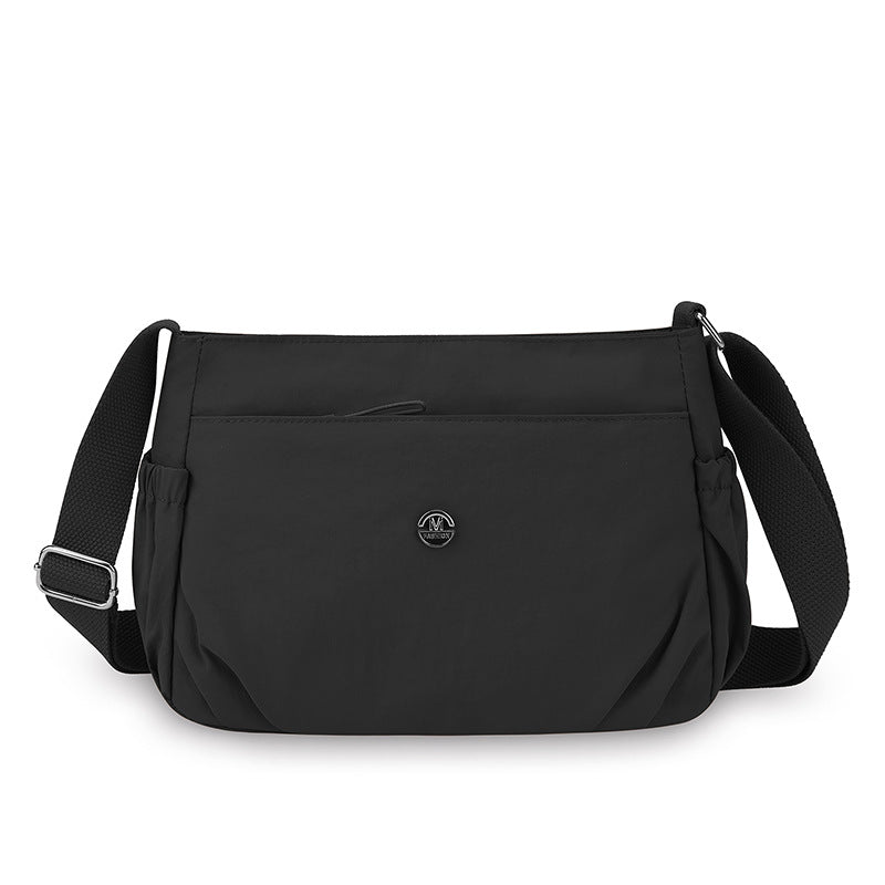 Simple new solid color shoulder bag women's light casual versatile outdoor small square bag fashionable commuter pleated messenger bag
