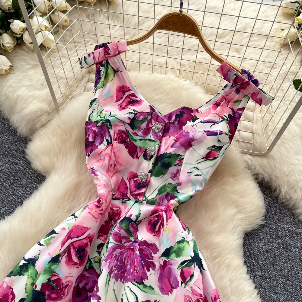 High-end floral print sleeveless dress for women, perfect for summer. elegant, high-waisted, and figure-flattering a-line silhouette, ideal for a sophisticated vacation look