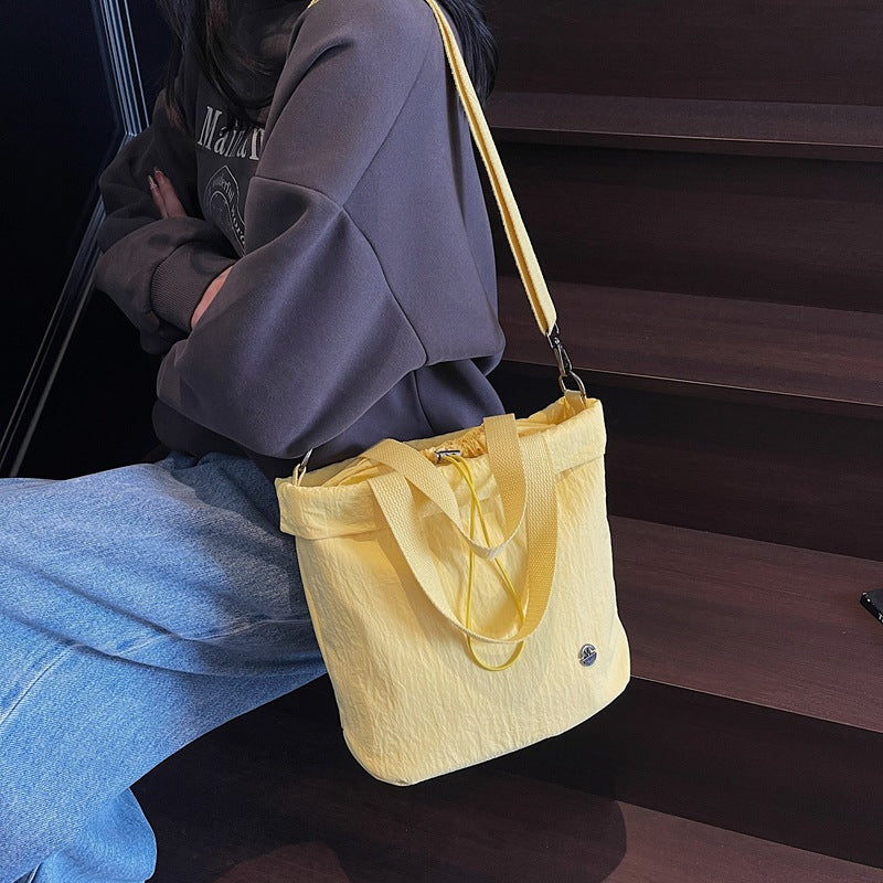 Casual bag women's 2025 new nylon drawstring bundle shoulder bag fitness yoga messenger bag commuter tote bag