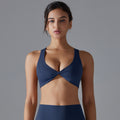 European and american nude feel yoga wear women's tight-fitting quick-dry sports bra sexy cutout backless running fitness push-up bra