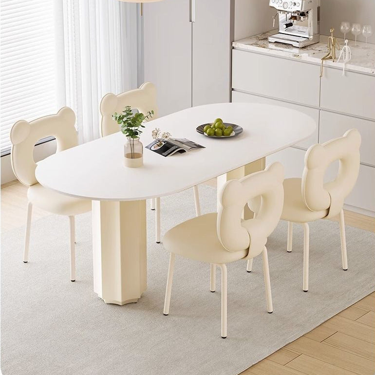 Cream style household rock slab oval dining table small apartment modern simple Internet celebrity light luxury family pure white rice table and chairs