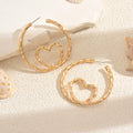 Wholesale gold earrings: european & american cross-border jewelry accessories - new, niche, light luxury, high-end, minimalist hoop & heart drop earrings for women