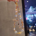 Classy mobile phone chain beaded crystal saturn sparkling new chinoiserie bag camera hanging chain short mobile phone case lanyard