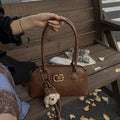 Korean style niche versatile shell bag for women - autumn 2025 retro work commute shoulder bag - high-end handbag