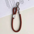 Adjustable polyester wrist lanyard - durable anti-loss phone strap with short chain, sturdy double buckle, and clip for outdoor use