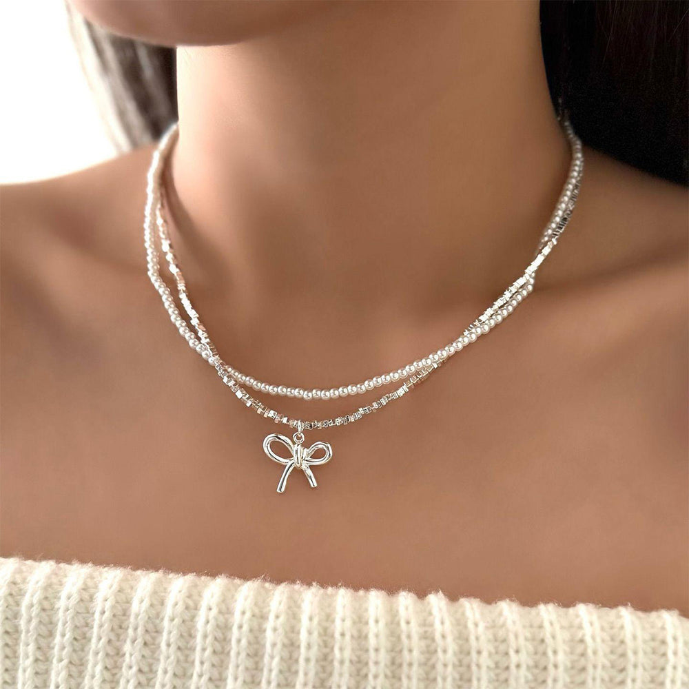 Wholesale bowknot necklaces - european & american cross-border jewelry - minimalist fashion pendants - women's alloy diamond-studded chokers & sweater chains