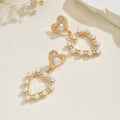 European and american cross-border casual sweet heart pearl earrings - light luxury, high-end, elegant, versatile, hollow heart stud earrings for women