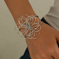 Multi-layered flower ring earrings wholesale cross-border niche design wrapped accessories irregular lines hollow bracelet for women