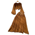French style women's autumn outfit: elegant cinched-waist cropped lantern sleeve blouse with high-waisted, flowy slit midi skirt two-piece set
