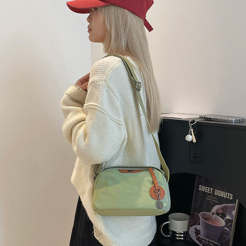 Light commuter women's shoulder bag fashionable and simple versatile messenger bag  large-capacity water-proof boys cloth bag