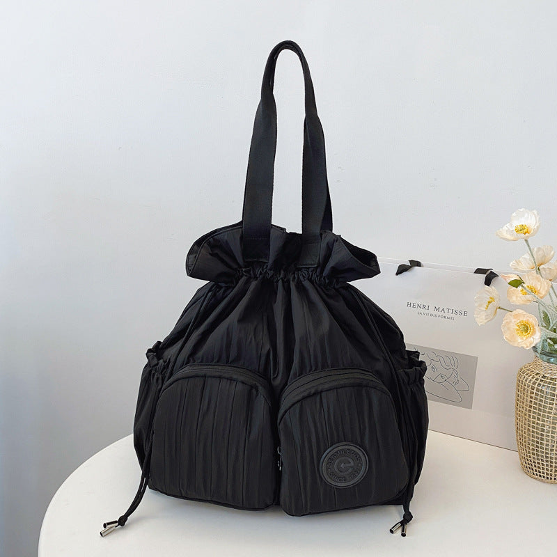 Cross-border college style high-value large-capacity backpack women's 2025 new niche pleated drawstring shoulder bag