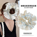 Sweet ballet style satin bow scrunchie - perfect for ponytails, buns, and hair ties