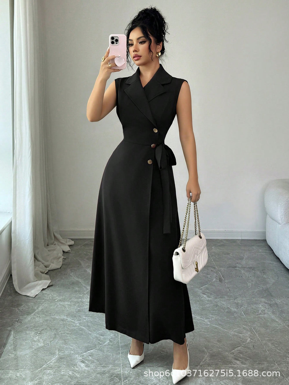 summer new arrival: black sleeveless dress with suit collar, cinched waist, and tie detail - long work dress