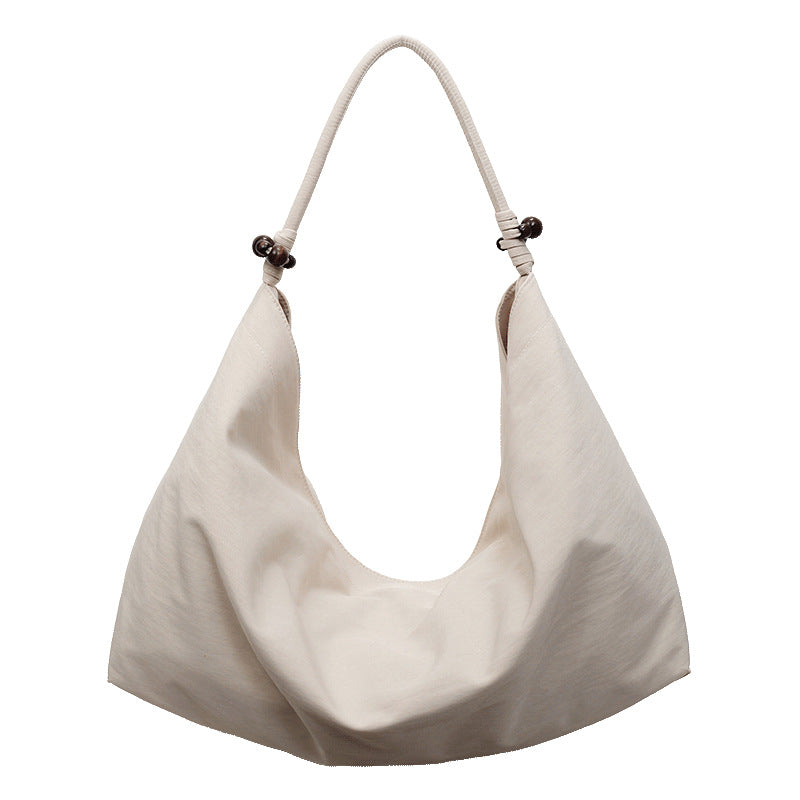 Simple and stylish large-capacity tote bag for women, a trendy new arrival for autumn and winter. perfect as a fabric bag for travel, leisure, and everyday use, or as a shoulder bag