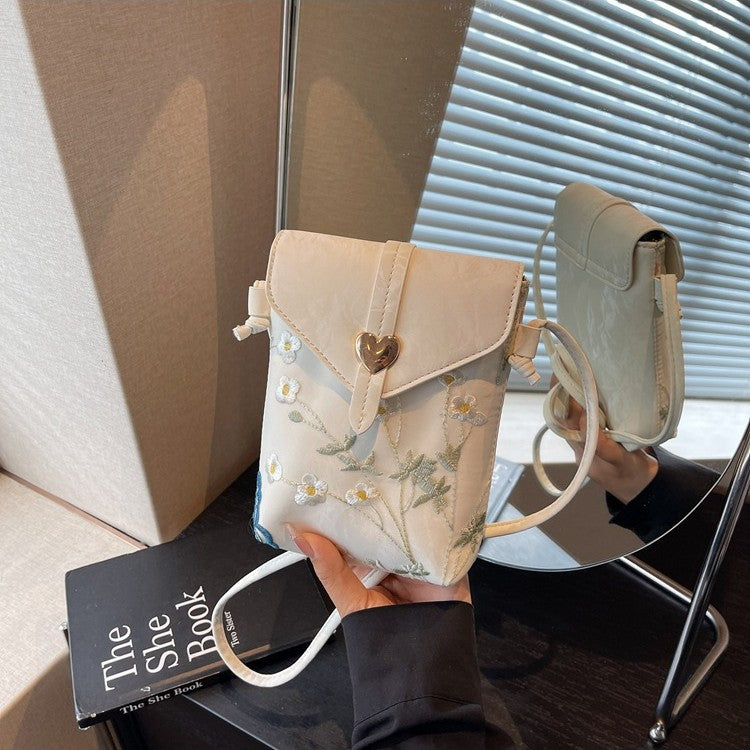Cross-border embroidered canvas bag women's summer 2025 new fashion niche messenger bag Korean version Internet celebrity popular mobile phone bag
