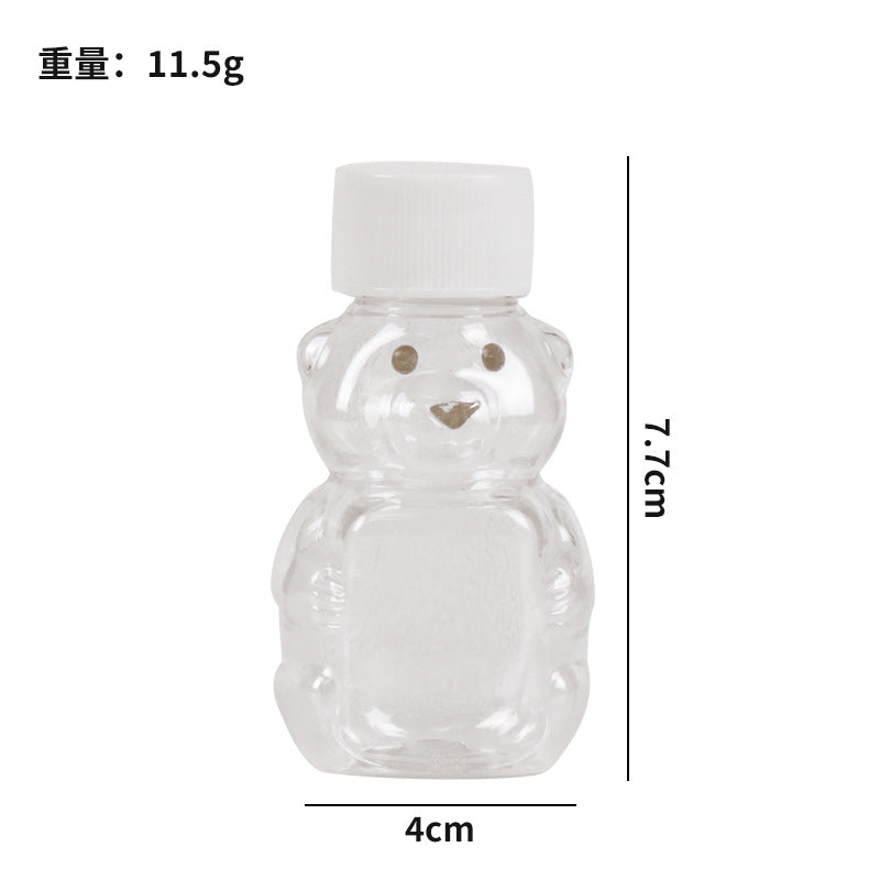 hot seller: bear-shaped clear pp plastic bottles with lids - perfect for juice, drinks, sauces, and honey. airtight sealing