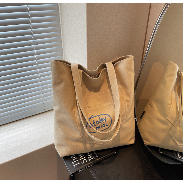 Cross-border canvas bag women's large-capacity 2025 new summer versatile simple shoulder bag casual college student tote bag