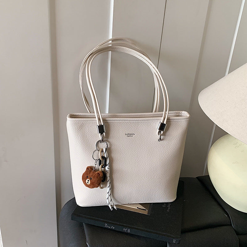 This year's trendy solid color women's bag: 2026 new fashion shoulder tote bag, versatile for commuting and casual use, women's handbag