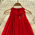 French-inspired, three-dimensional floral halter neck sleeveless dress for women. loose-fitting, slimming, casual, and featuring an asymmetrical hem in a vibrant red