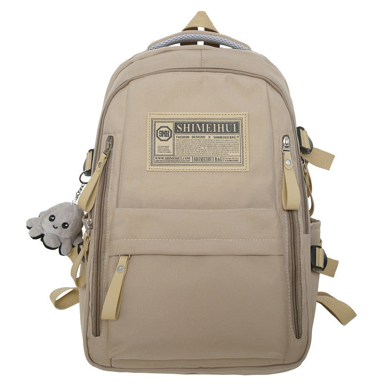 Spring and summer simple travel backpack computer backpack casual solid color ultra-light junior high school students large-capacity schoolbag