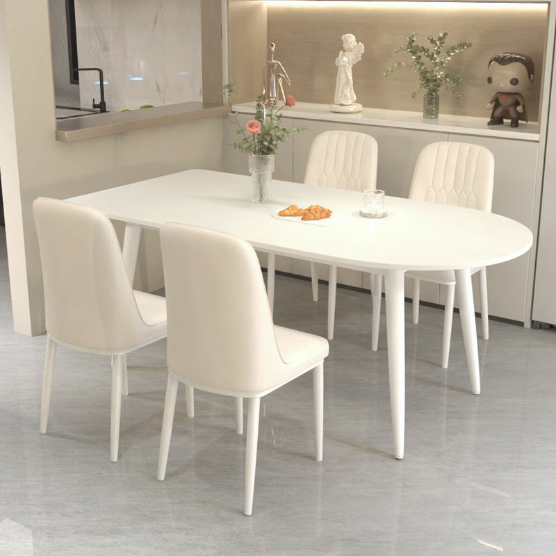 Modern minimalist light luxury table peninsula pure white rock slab dining table and chair set, home small apartment cream style dining table