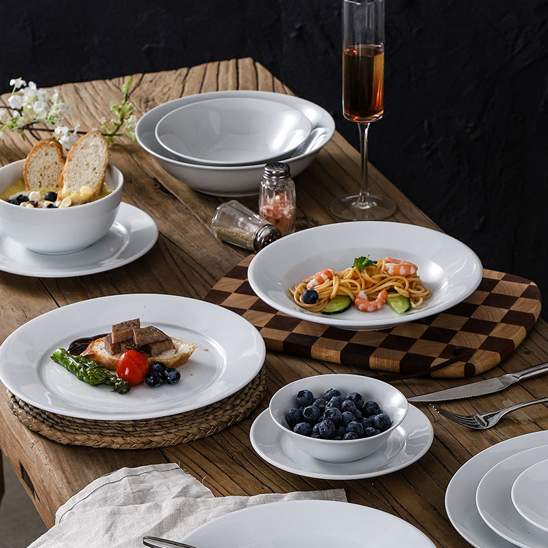 Minimalist pure white ceramic dinnerware set - ideal for restaurants, hotels, and home use. includes plates, rice bowls, soup bowls, and fruit/salad plating dishes