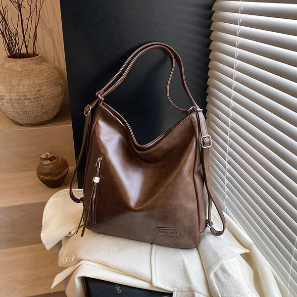 2025 new large-capacity commuter backpack women's bag autumn and winter relaxation personalized double zipper shoulder tote bag