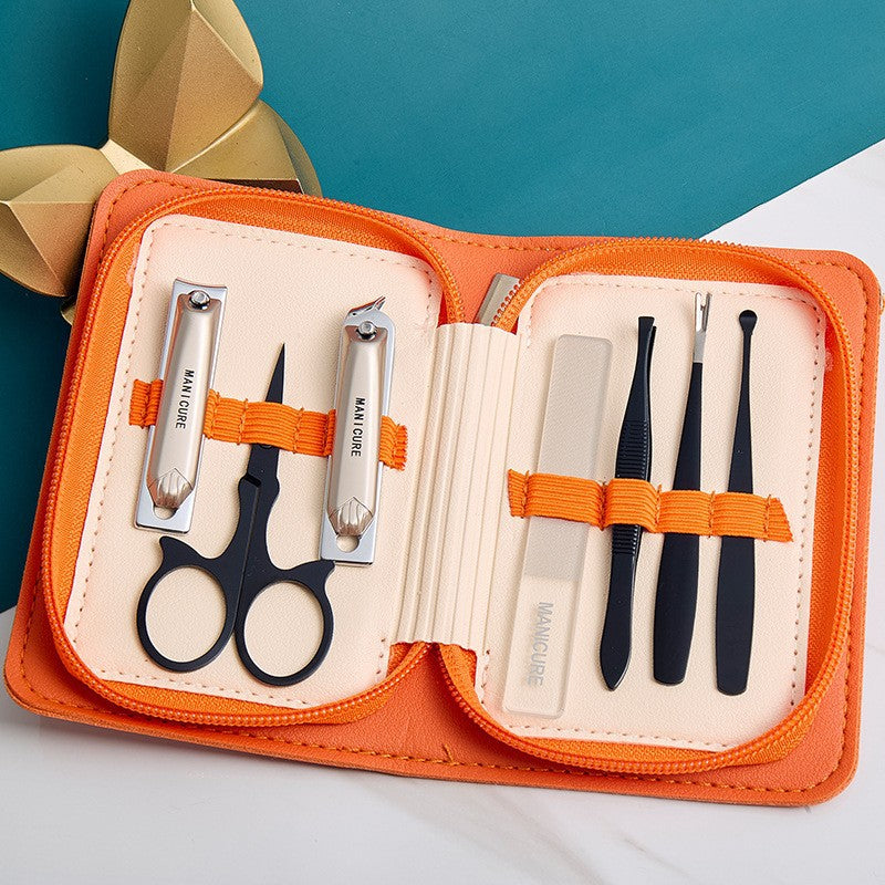 Stainless steel manicure & pedicure tool set - 9 piece kit: includes nail clippers, eyebrow scissors, earwax removal tool, and nail file - wholesale