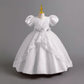 Ready-to-ship wholesale princess dresses with puff sleeves and lace detailing, perfect for children's formal wear, birthdays, piano recitals, and performances. kids' dresses