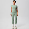 European and american solid color nude feel brushed short-sleeve yoga top and high-waisted butt-lifting fitness leggings quick-dry running workout set