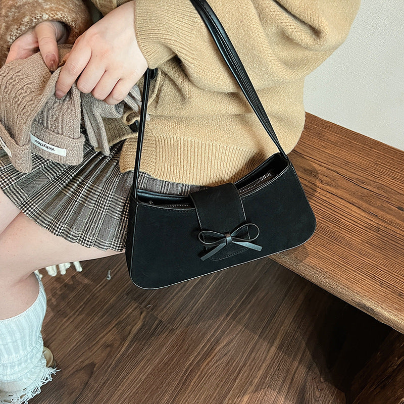 Red bag women's bag 2025 new shoulder baguette bag Korean version fashion minimalist niche bow armpit bag