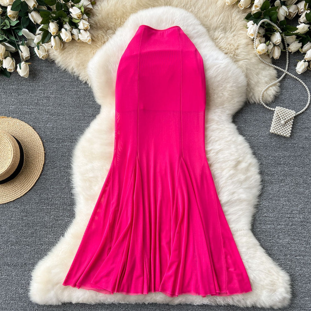 High-end, sophisticated, and effortlessly chic: this versatile midi skirt is perfect for the modern woman's commute. featuring a stylish design with elastic detailing, a figure-flattering fit, and a trendy mesh and fishtail hem, this skirt is a must-have