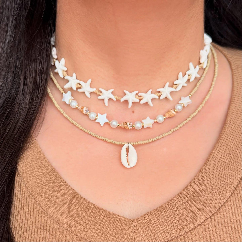 Wholesale autumn/winter sweater necklaces: european & american cross-border style - ocean-inspired starfish & seashell jewelry, subtly luxurious, niche design, stackable pearl chokers