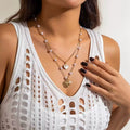 European and american cross-border jewelry: ocean-themed metal starfish and seashell necklace set with designer faux pearl chain