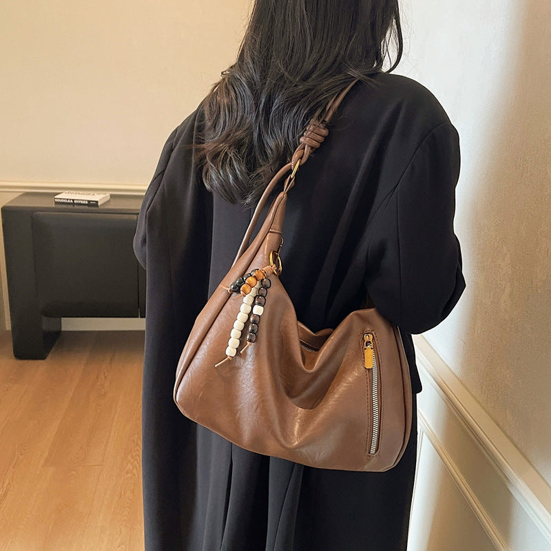 Crossbody bag 2025 new autumn/winter versatile light luxury niche high-value shoulder bag large capacity commuter tote women's bag