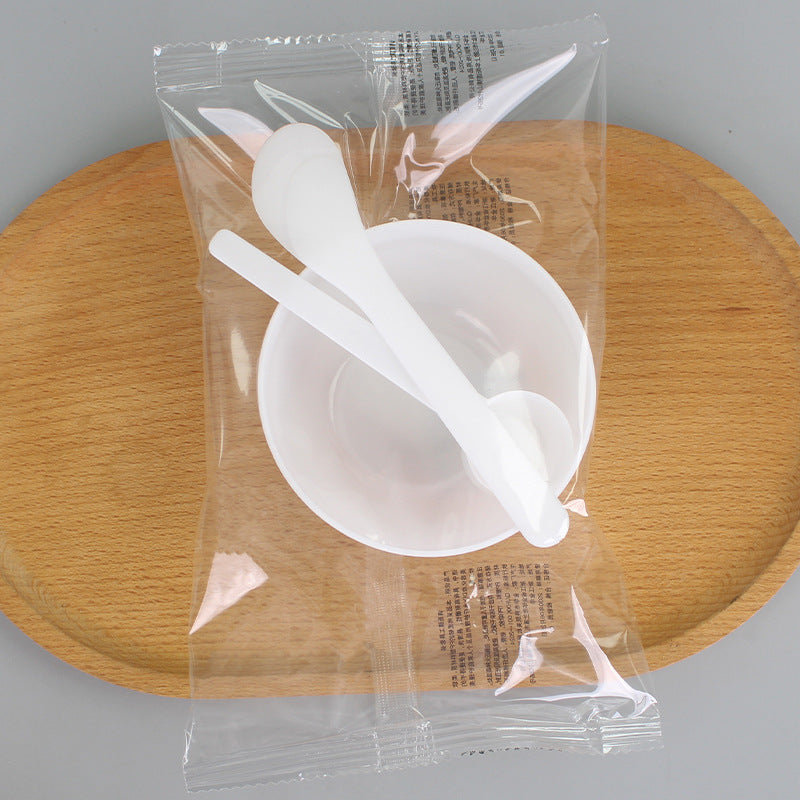 Individually packaged beauty mask bowl set - 3-piece spa tool kit: plastic bowl, mixing spatula, and measuring spoon with graduated markings
