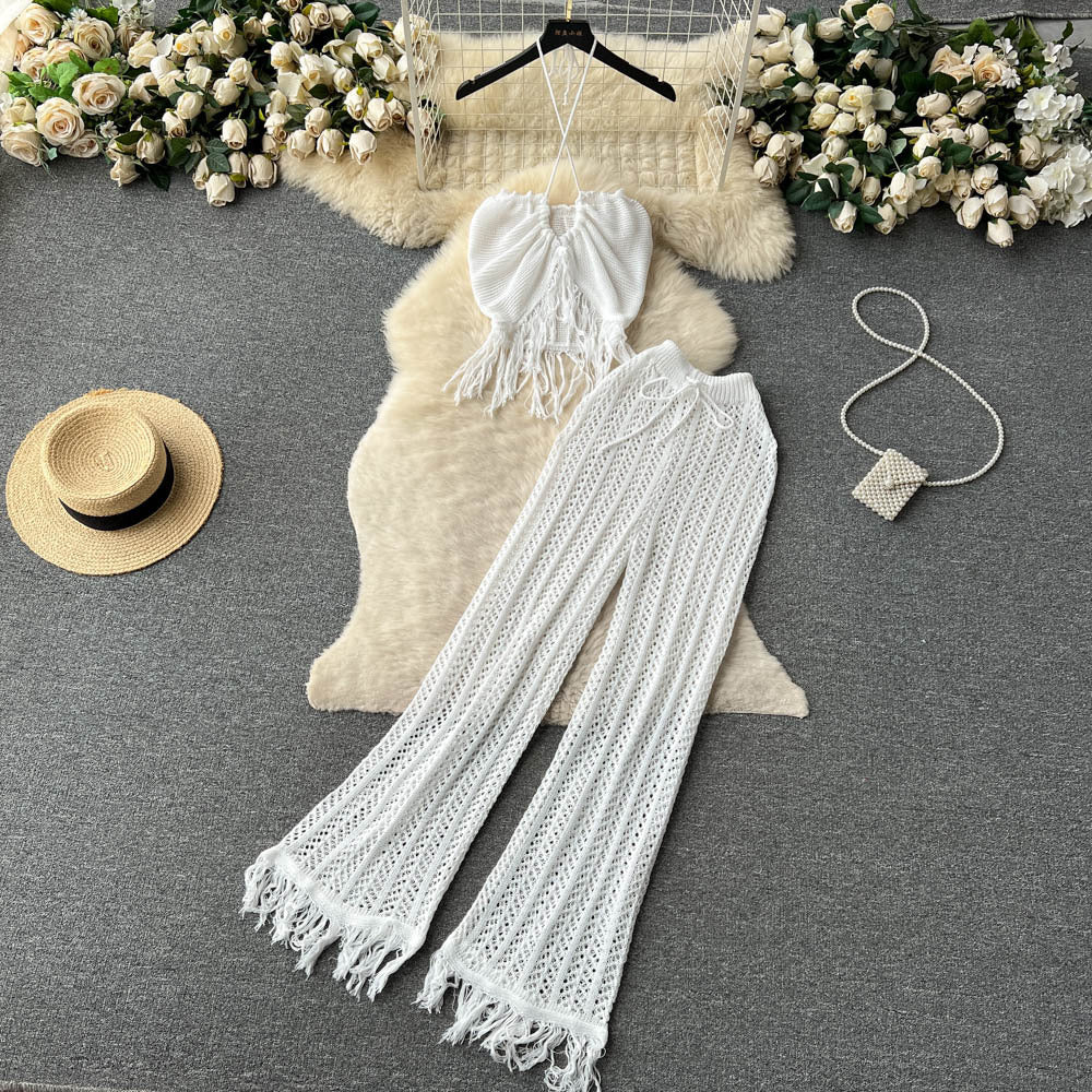 Bohemian beach vacation set for women: summer knit tassel halter top and high-waisted cutout pants two-piece outfit