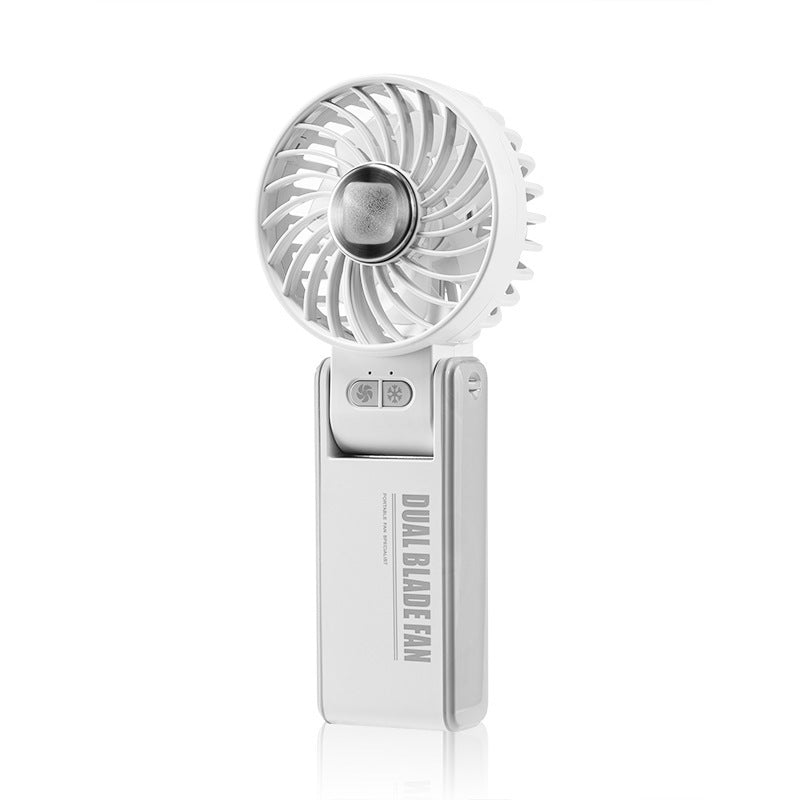 K67 handheld fan, strong wind force, cold compress, foldable color box, various designs, small fan