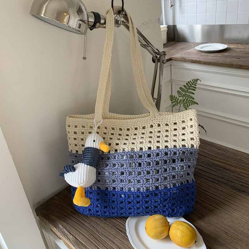 Cross-border 2025 new simple large-capacity woven bag women's wool crocheted hollow shoulder bag gift vacation beach bag